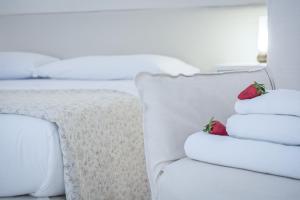 Uma cama ou camas num quarto em Dimora Dell'Osanna