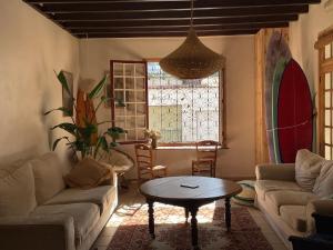 Posezení v ubytování L'escale Surf Hostel - Auberge de jeunesse