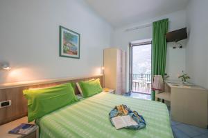 Voodi või voodid majutusasutuse Dint'a Torre Bed and Breakfast toas