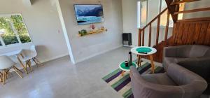 TV a/nebo společenská místnost v ubytování Aonikenk B&B