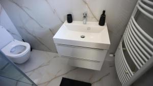 Ein Badezimmer in der Unterkunft Kokavská izba - Apartmány