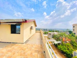 a view from the balcony of a house at Hotel Résidence Essiéniguet in Abidjan