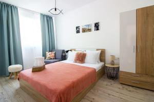 A bed or beds in a room at Tarno Guest House