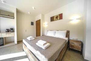 Postel nebo postele na pokoji v ubytování My Bali Suites