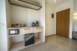 Kuchyň nebo kuchyňský kout v ubytování My Bali Suites