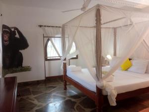 Postel nebo postele na pokoji v ubytování Villa Eden + 20 fotografií