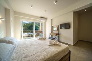 Postel nebo postele na pokoji v ubytování My Bali Suites