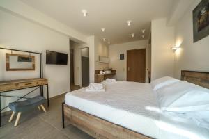 Postel nebo postele na pokoji v ubytování My Bali Suites