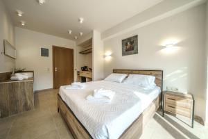 Postel nebo postele na pokoji v ubytování My Bali Suites