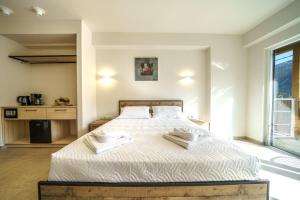Postel nebo postele na pokoji v ubytování My Bali Suites