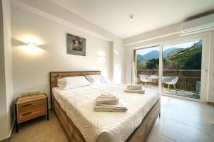 Postel nebo postele na pokoji v ubytování My Bali Suites