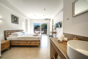 Postel nebo postele na pokoji v ubytování My Bali Suites