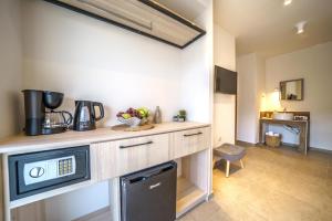 Kuchyň nebo kuchyňský kout v ubytování My Bali Suites
