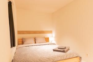 Hotel Rütli am Bahnhof Rüti ZH客房内的一张或多张床位