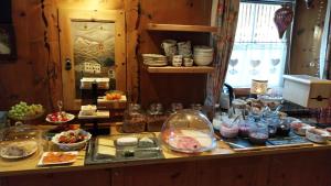 a counter with a bunch of food on it at Thalerhof in Roppen