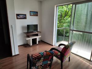 Televisyen dan/atau pusat hiburan di Apart. hotel Vitrine