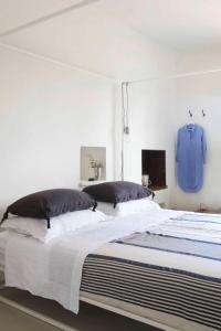 Postel nebo postele na pokoji v ubytování Villas with pool at Ostuni + 61 fotografií