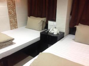Voodi või voodid majutusasutuse ILoilo Guest House toas