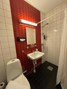 Koupelna v ubytování Hotel Jämteborg + 28 fotografií