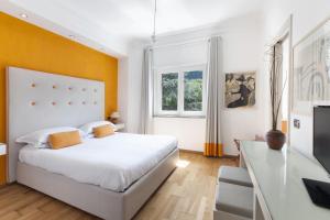Ένα ή περισσότερα κρεβάτια σε δωμάτιο στο AMORE RENTALS - Casa Amore +44 φωτογραφίες