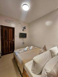 Postel nebo postele na pokoji v ubytování JaiJai's Backpackers Inn