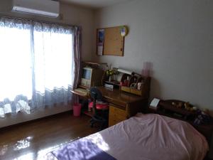 Postel nebo postele na pokoji v ubytování OSO Homestay
