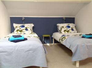 מיטה או מיטות בחדר ב-B&B Op Kolderveen