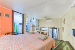 Posteľ alebo postele v izbe v ubytovaní Nolo Loft in Milan
