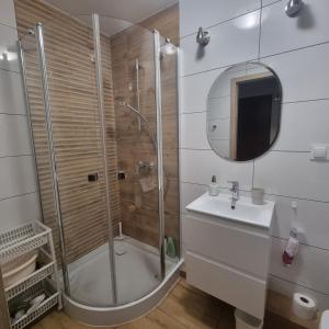 Kúpeľňa v ubytovaní Apartament na Przymorzu + 9 fotografií