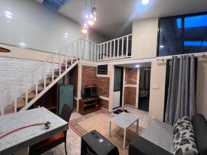 Posezení v ubytování Avocado Accommodations
