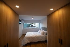 En eller flere senge i et værelse på Casa da Timpeira - Vila Real