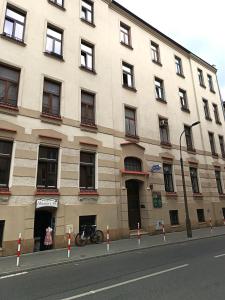 a building with a bike parked in front of it at Charming Rustic Old Town Apartment in Krakow