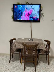 TV a/nebo společenská místnost v ubytování Camera Brupier