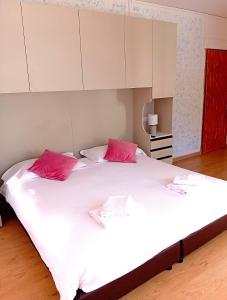 Rúm í herbergi á Hotel B&B Lorenzini Ski