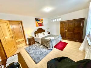 Ένα ή περισσότερα κρεβάτια σε δωμάτιο στο Quarto Eixo Atlântico
