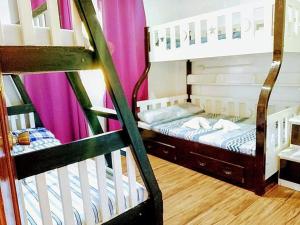 Postel nebo postele na pokoji v ubytování Bungalow in Holidays Beach Resort