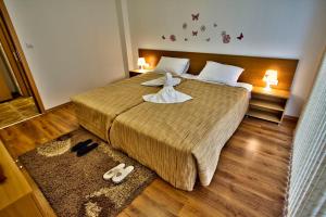 Postel nebo postele na pokoji v ubytování Holiday Homes Chudna