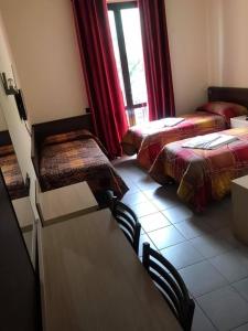 Postel nebo postele na pokoji v ubytování Hotel ristorante 2 Platani