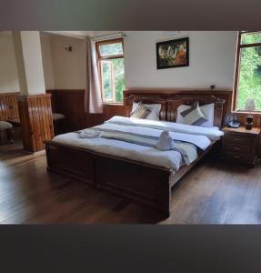 Postel nebo postele na pokoji v ubytování The Retreat four star resort