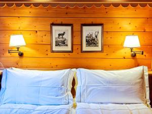 Ένα ή περισσότερα κρεβάτια σε δωμάτιο στο Hotel Breithorn