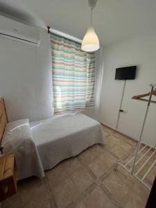 TV a/nebo společenská místnost v ubytování Hostal Barbate