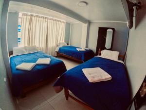 Postel nebo postele na pokoji v ubytování Hotel Piura + 15 fotografií