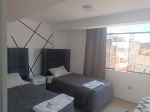Postel nebo postele na pokoji v ubytování Dept 301 piso 03 Consultar Cochera,
