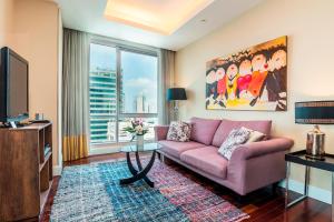 TV a/nebo společenská místnost v ubytování SkyVillas Residential Apartments