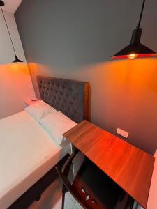Voodi või voodid majutusasutuse Hotel Almalu toas