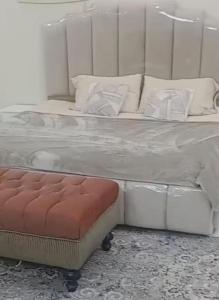 Postel nebo postele na pokoji v ubytování البيت بيتك للضيافة الخاصة