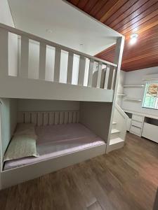 Ένα ή περισσότερα κρεβάτια σε δωμάτιο στο Casa Praia
