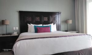 Medano Beach suites客房内的一张或多张床位