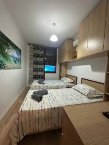 Ένα ή περισσότερα κρεβάτια σε δωμάτιο στο Potka Apartments