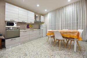 Η κουζίνα ή μικρή κουζίνα στο Casa di mamma +7 φωτογραφίες